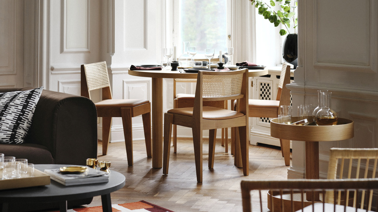 IKEA - A modern Scandinavian dining room that blends with the living area