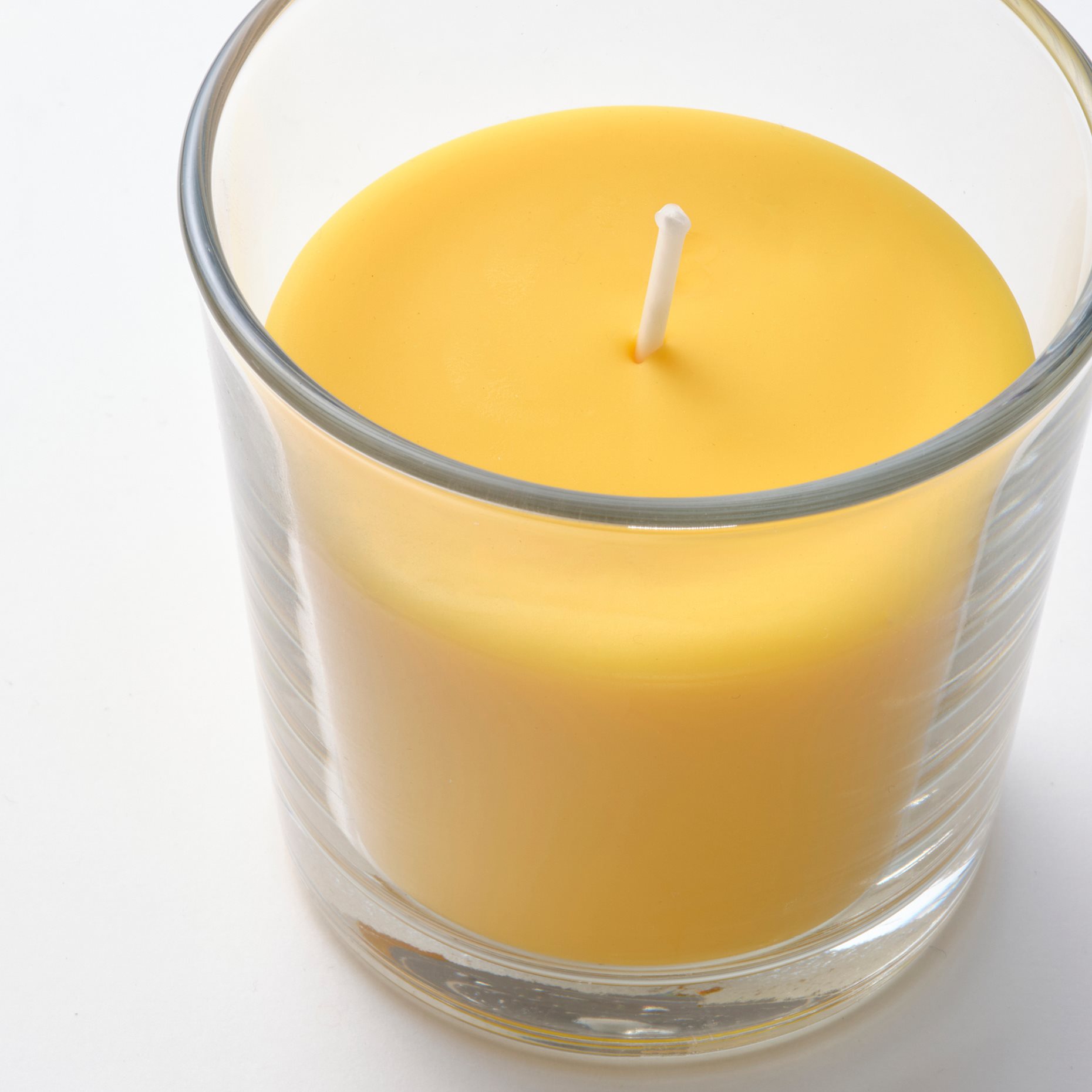 SVARTOXBÄR, scented candle in glass/mimosa, 25 hr, 005.826.68