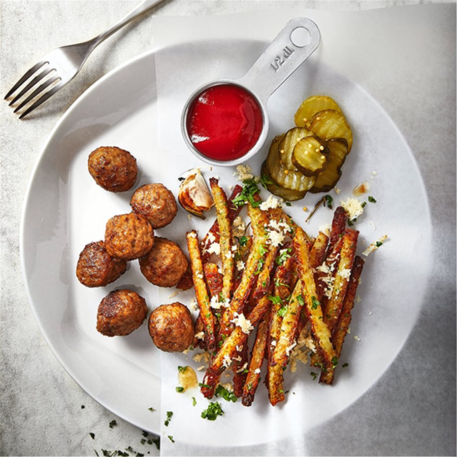 Chicken meatballs with RÖSTI potato fritters, cheese and fresh herbs